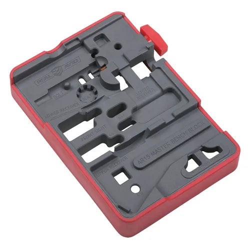 Czarno-czerwony blok rusznikarski Real Avid AR-15 Master Bench Block z grawerowanymi oznaczeniami pinów, magnesami i wbudowanym tłokiem do serwisu zamka