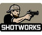 SHOTWORKS - logo z mężczyzną celującym z pistoletu, sklep strzelecki, wszystko dla strzelców