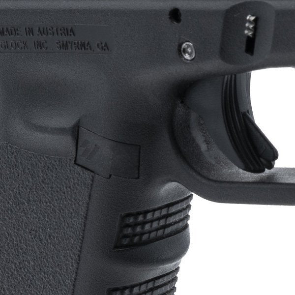 Konstrukcja polimerowo-aluminiowego zatrzasku magazynka Strike Industries do broni Glock.